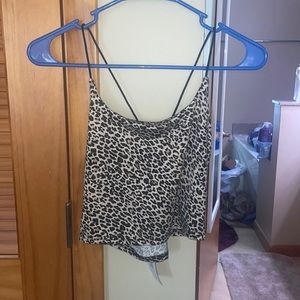 Cheetah Print crap top with cross back straps.